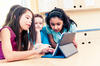 Kids using an iPad Kids using an iPad