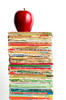 Stack of books with apple on top Stack of books with apple on top