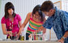 Students doing a science experiment Students doing a science experiment