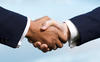 Black man and white man shaking hands Black man and white man shaking hands