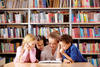 Students and teacher reading in the library Students and teacher reading in the library