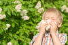 Boy sneezing Boy sneezing