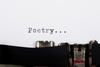 typewriter spelling out 'poetry' typewriter spelling out 'poetry'