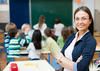 Teacher standing in front of students Teacher standing in front of students