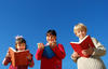 Three kids reading Three kids reading