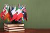 flags on top of books flags on top of books