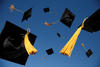 graduation caps thrown in the air graduation caps thrown in the air