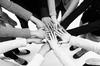 women putting their hands together women putting their hands together