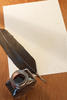 paper with ink and a quill paper with ink and a quill