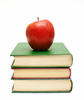 stack of books with apple on top stack of books with apple on top