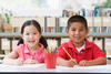 Two kids at a desk Two kids at a desk