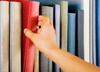 hand reaching for book hand reaching for book