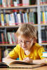 young boy reading young boy reading