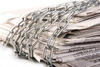newspaper wrapped in chains newspaper wrapped in chains