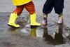 Kids Playing in a Puddle Kids Playing in a Puddle